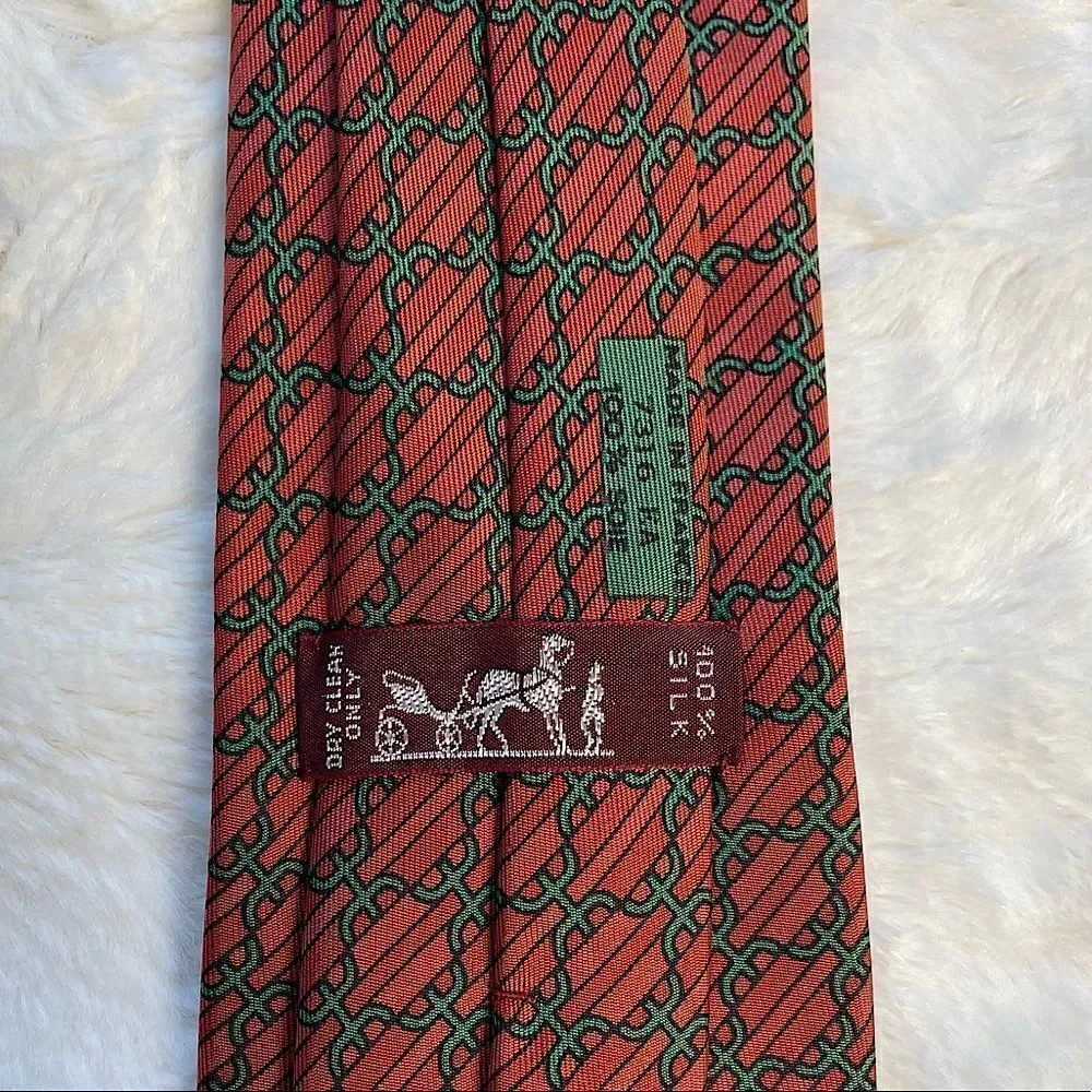 Hermès’ EUC Authentic‎ 100% Silk Rust Orange Geometric Tie